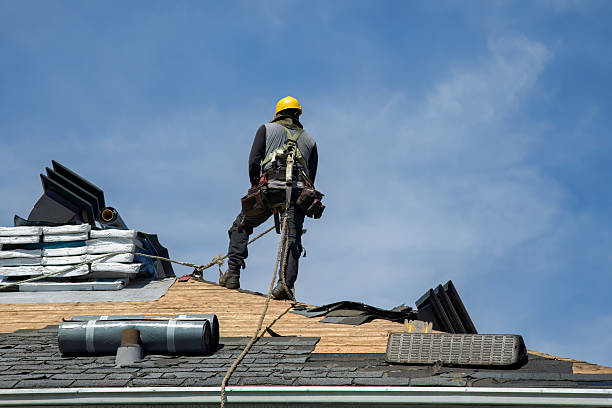 Professional Roofing technician working in Cambria, CA